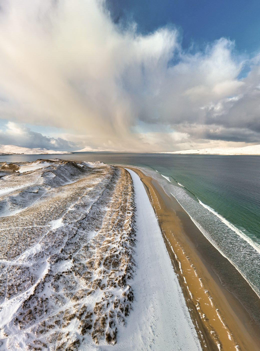 Aerial view of snow-covered dunes in the Outer Hebrides